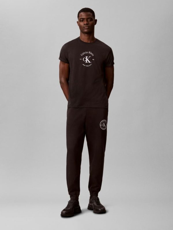 Jogger Hombre con gráfico crest - Negro
